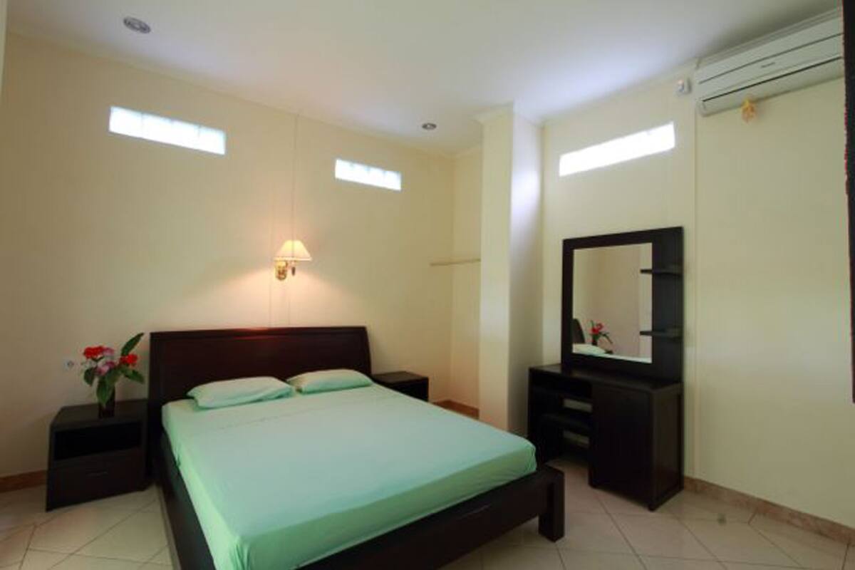 Habitación Deluxe (Airconditioned) | Cunas y wifi gratis