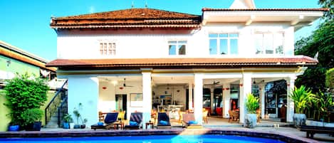 2 outdoor pools, open 9:00 AM to 9:00 PM, pool umbrellas, pool loungers