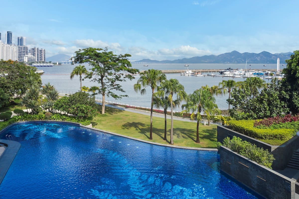 indoor pool, 2 outdoor pools, open 6:00 am to 10:00 pm, pool umbrellas