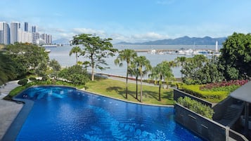 Indoor pool, pool umbrellas, pool loungers