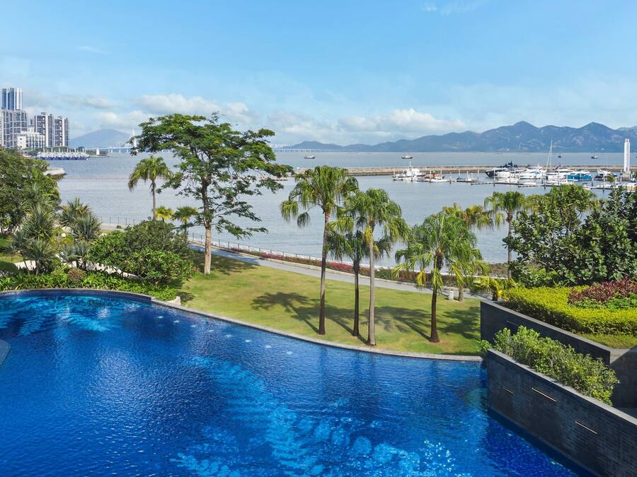 Indoor pool, 2 outdoor pools, open 6:00 AM to 10:00 PM, pool umbrellas