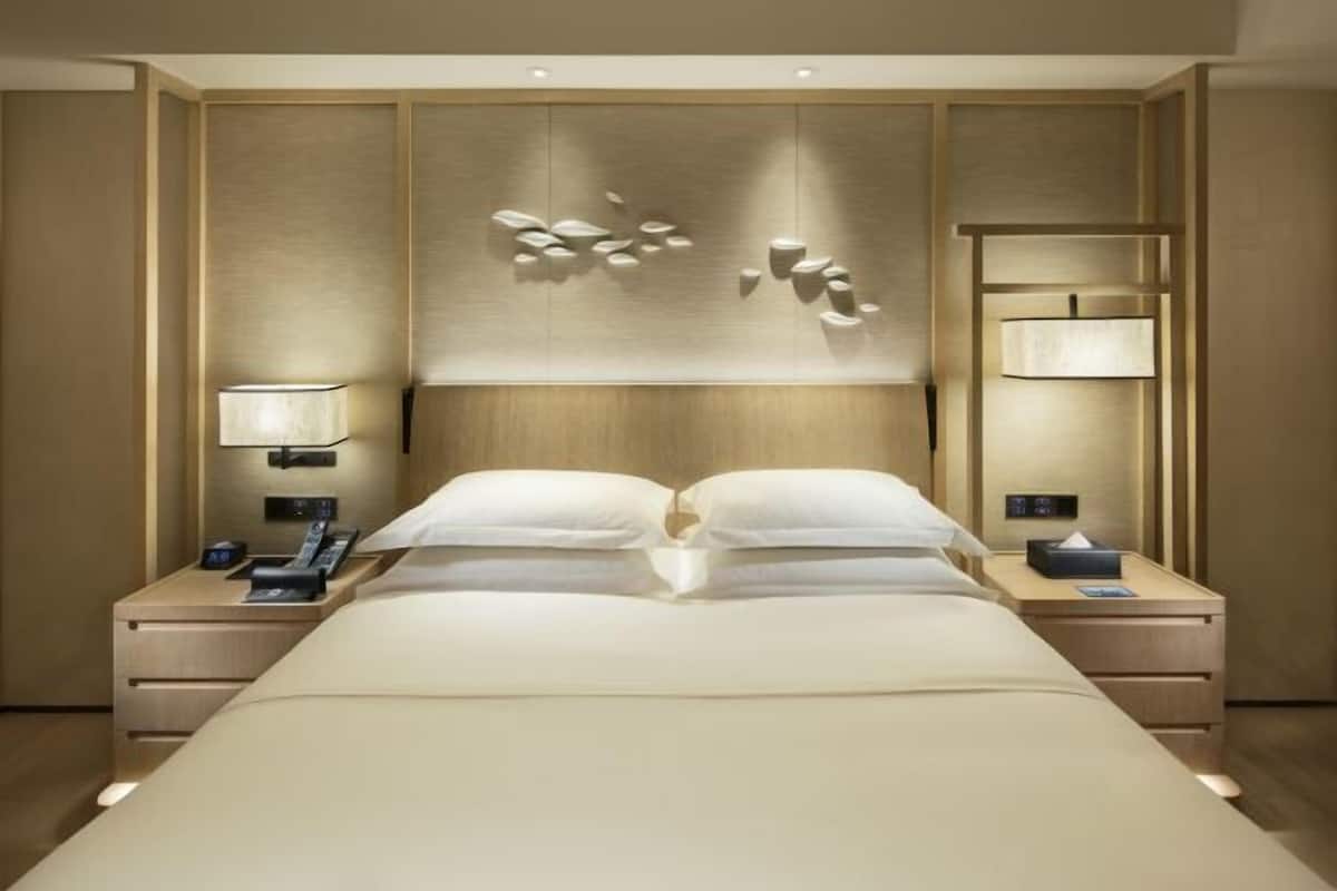 1 dormitorio, ropa de cama de alta calidad, minibar y caja fuerte
