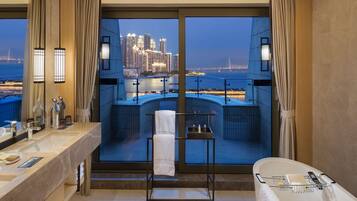 King One Bedroom Suite Nanhai Wing | Bathroom | Free toiletries, hair dryer, slippers, towels