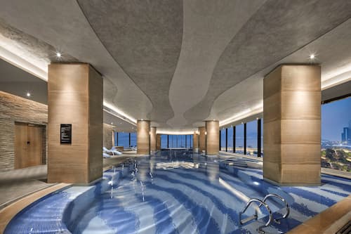 Indoor pool, 2 outdoor pools, open 6:00 AM to 10:00 PM, pool umbrellas