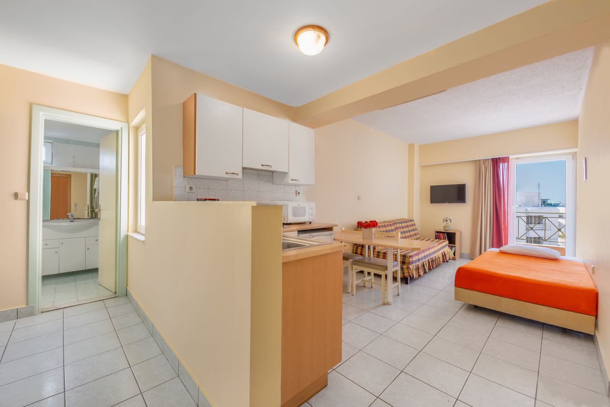 Superior Apartment, 1 Bedroom | Living area | TV