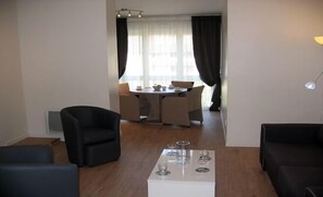 Comfort Apartment, 2 Bedrooms, Non Smoking (Type 3) | Living room | 80-cm LCD TV with digital channels, TV, DVD player - Résidence le Beau Site (Capvern)