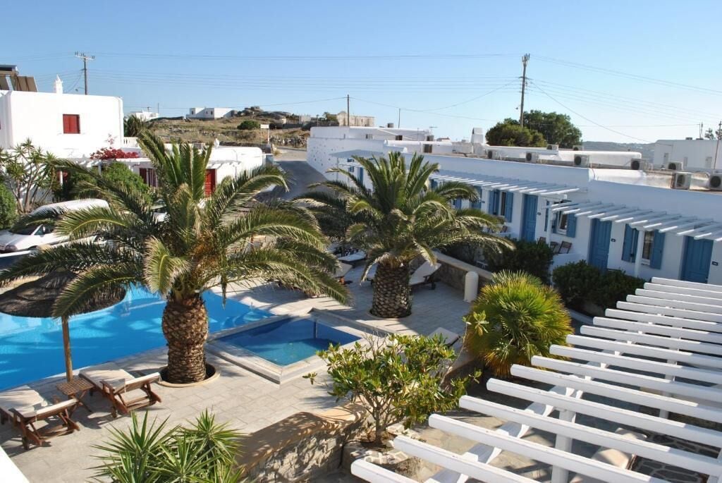 seasonal outdoor pool, pool umbrellas, pool loungers