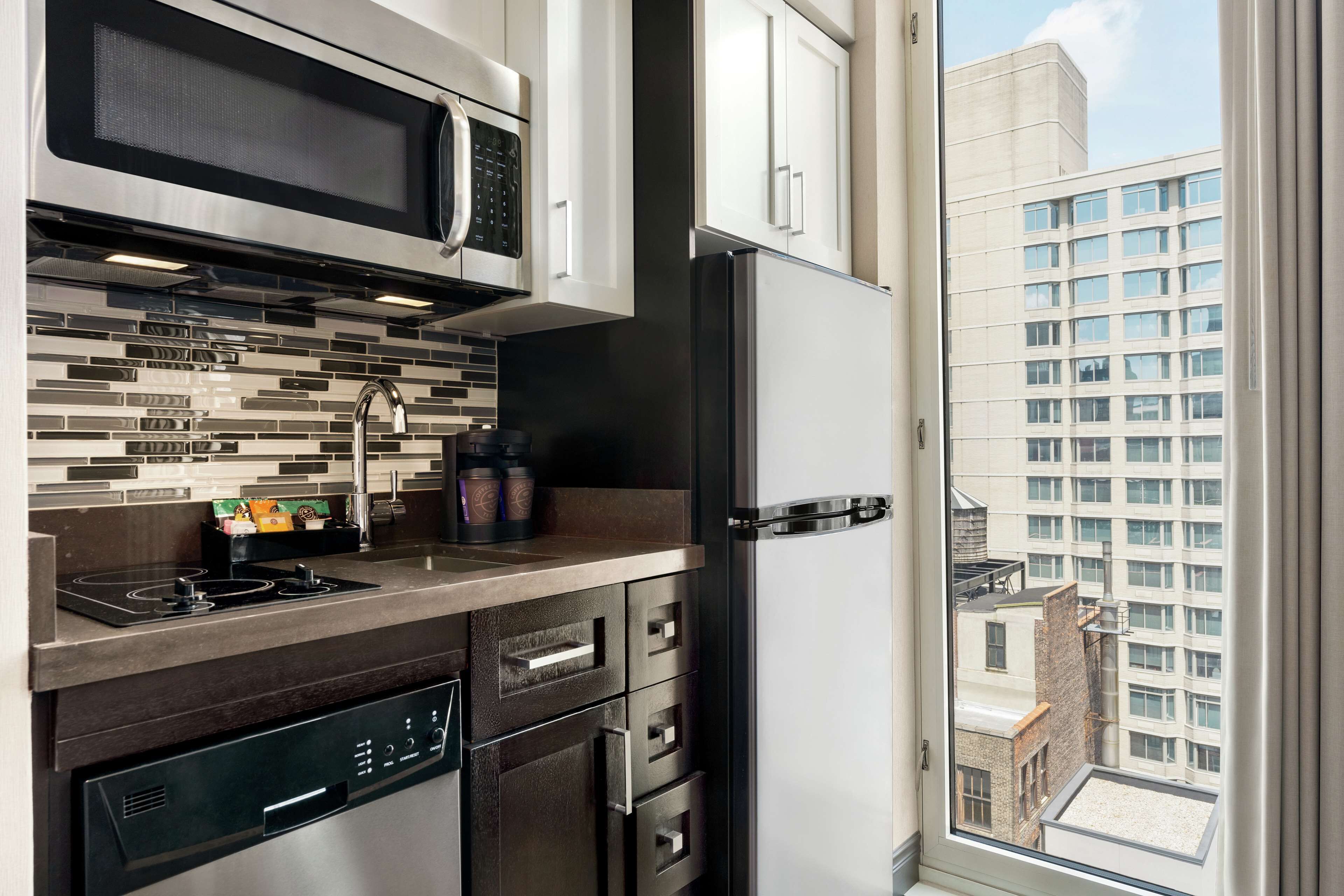 studio, 2 queen beds, non smoking | private kitchen | full-sized fridge, microwave, coffee/tea maker, cookware/dishes/utensils