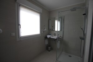 Deep soaking tub, hair dryer, bathrobes, towels