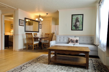 Suite | Living area | 65-inch Smart TV with satellite channels, TV, DVD player