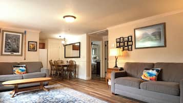 Suite | Living area | 65-inch Smart TV with satellite channels, TV, DVD player