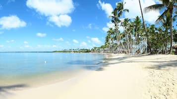 Private beach, beach umbrellas, beach towels, beach massages