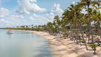 Private beach, beach umbrellas, beach towels, beach massages