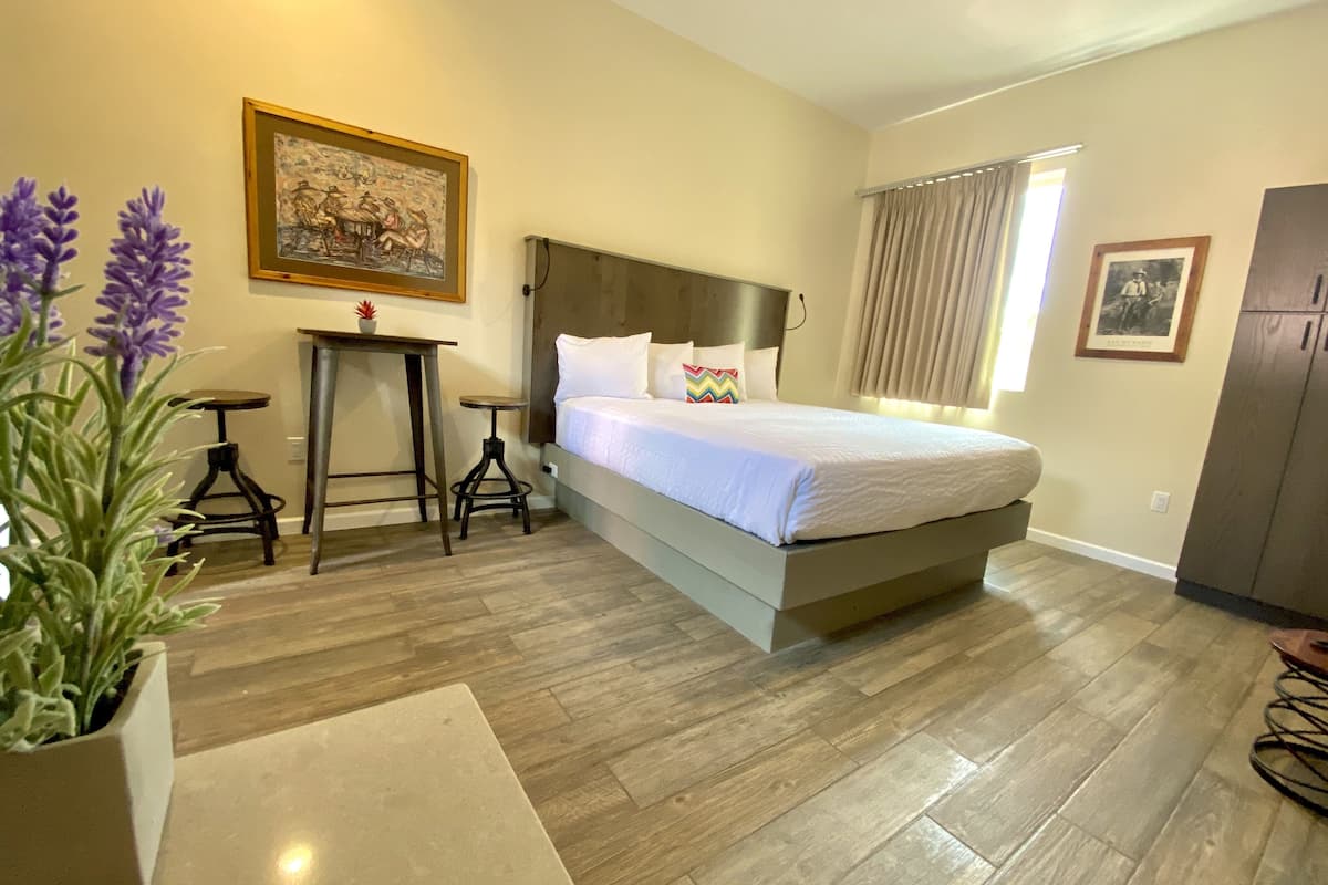 room, 1 king bed, courtyard area | 1 bedroom, individually decorated, individually furnished