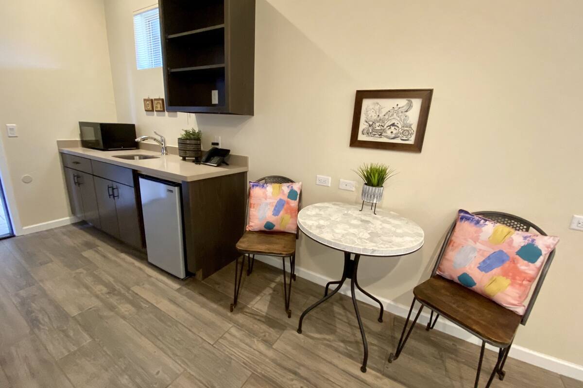 room, 1 king bed, fireplace, ground floor | in-room dining