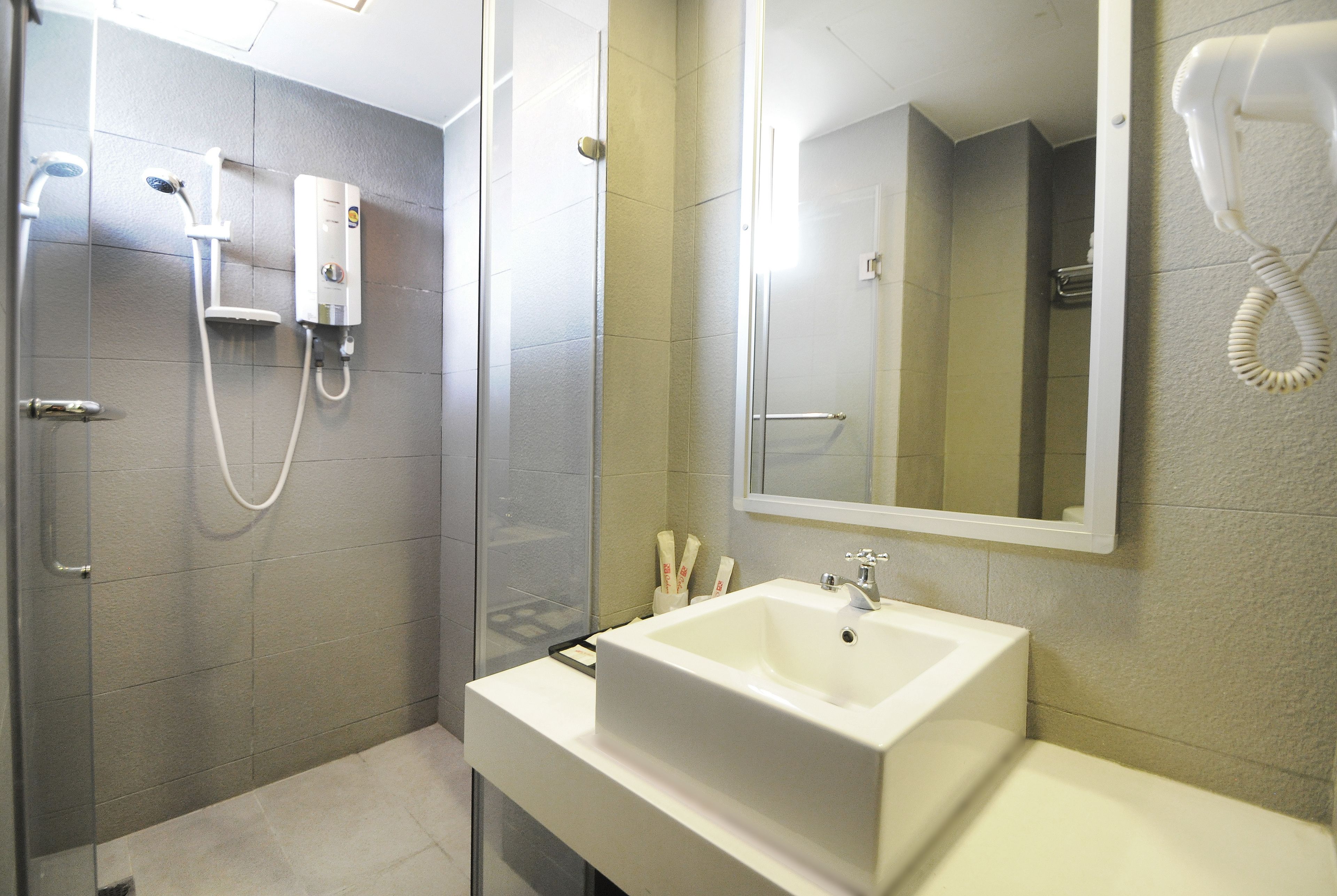 Shower, free toiletries, hair dryer, slippers
