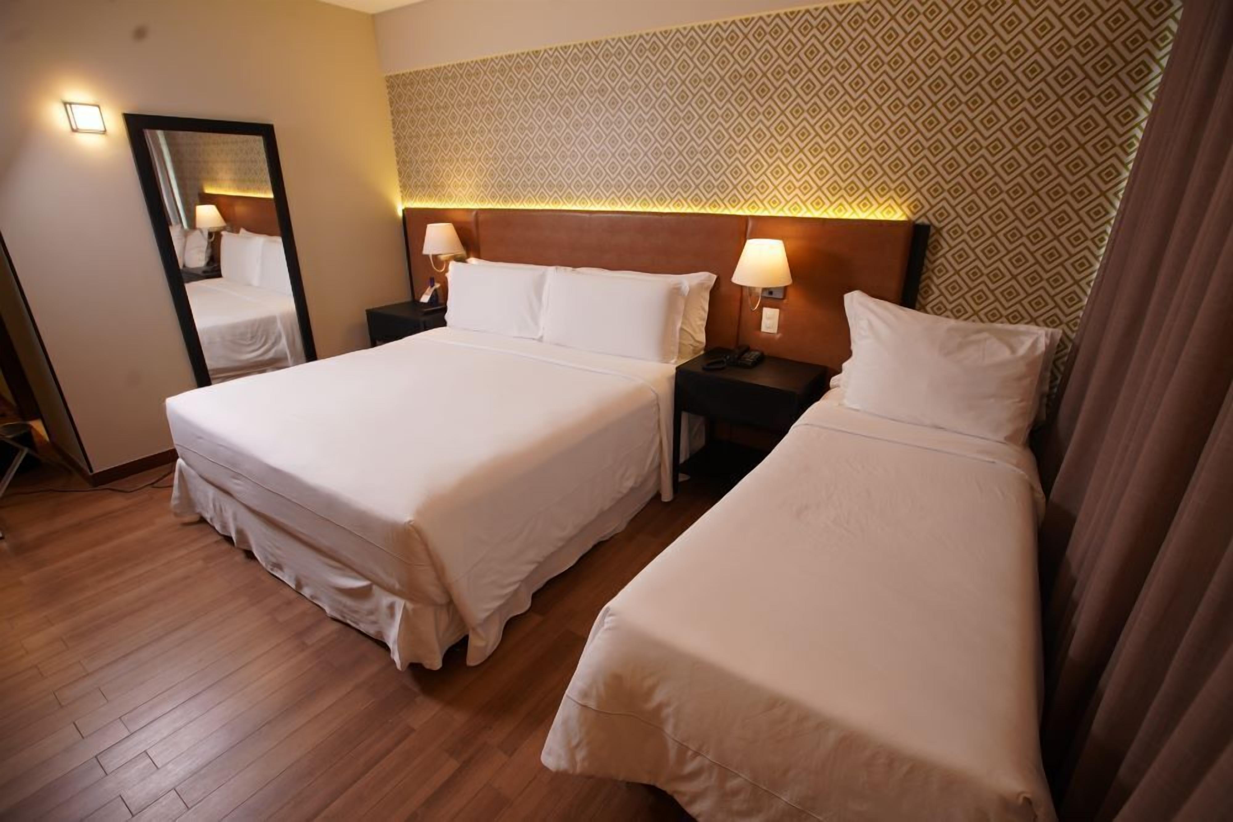 premier triple room | 1 bedroom, pillow-top beds, minibar, in-room safe