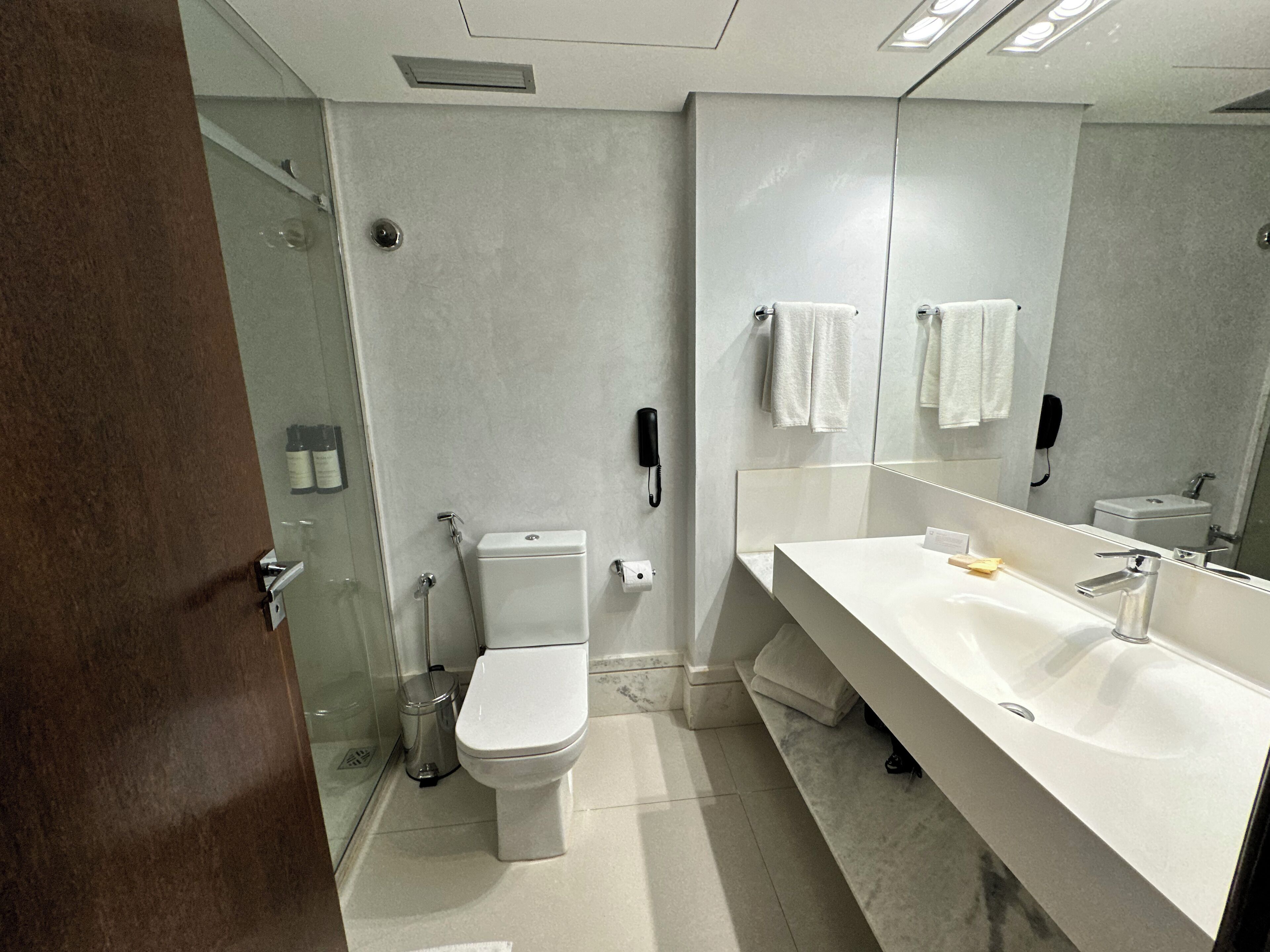 superior triple room | bathroom | shower, rainfall showerhead, designer toiletries, hair dryer