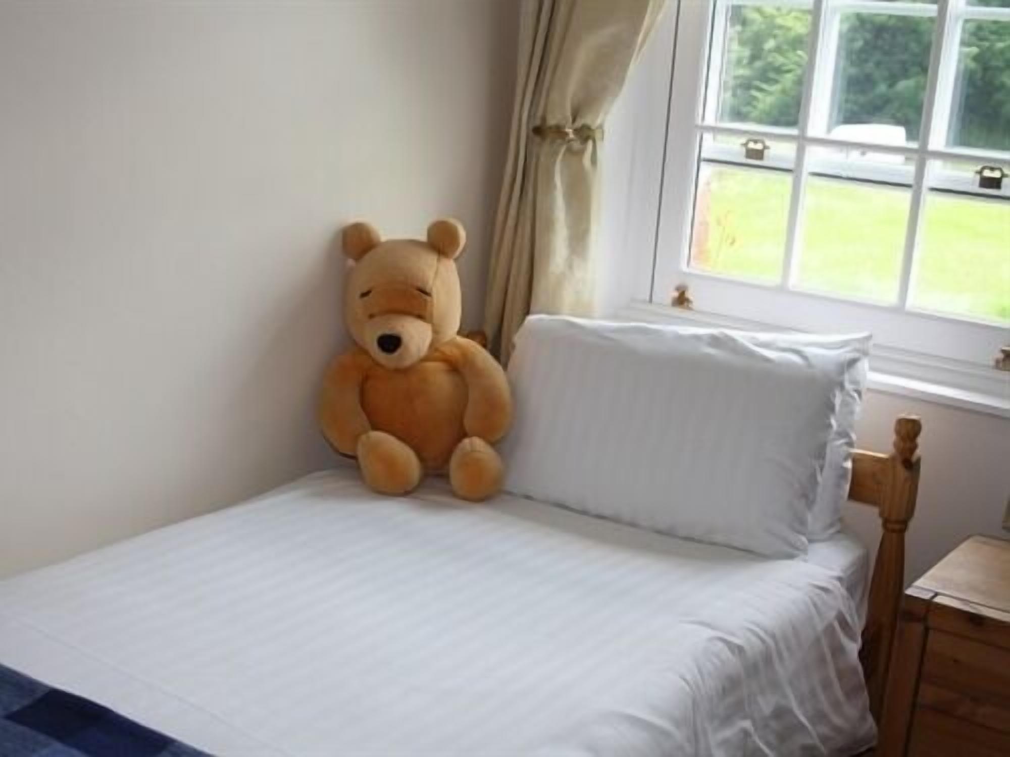 iron/ironing board, cots/infant beds, free wifi, bed sheets