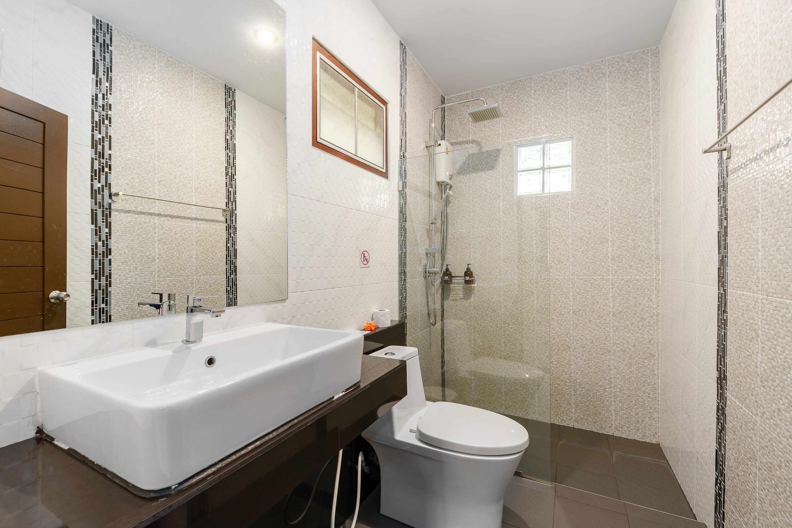 mini deluxe seaview bungalow | bathroom | hair dryer, towels