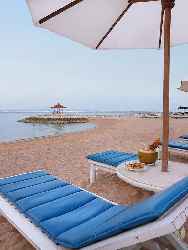 On the beach, sun loungers, beach umbrellas