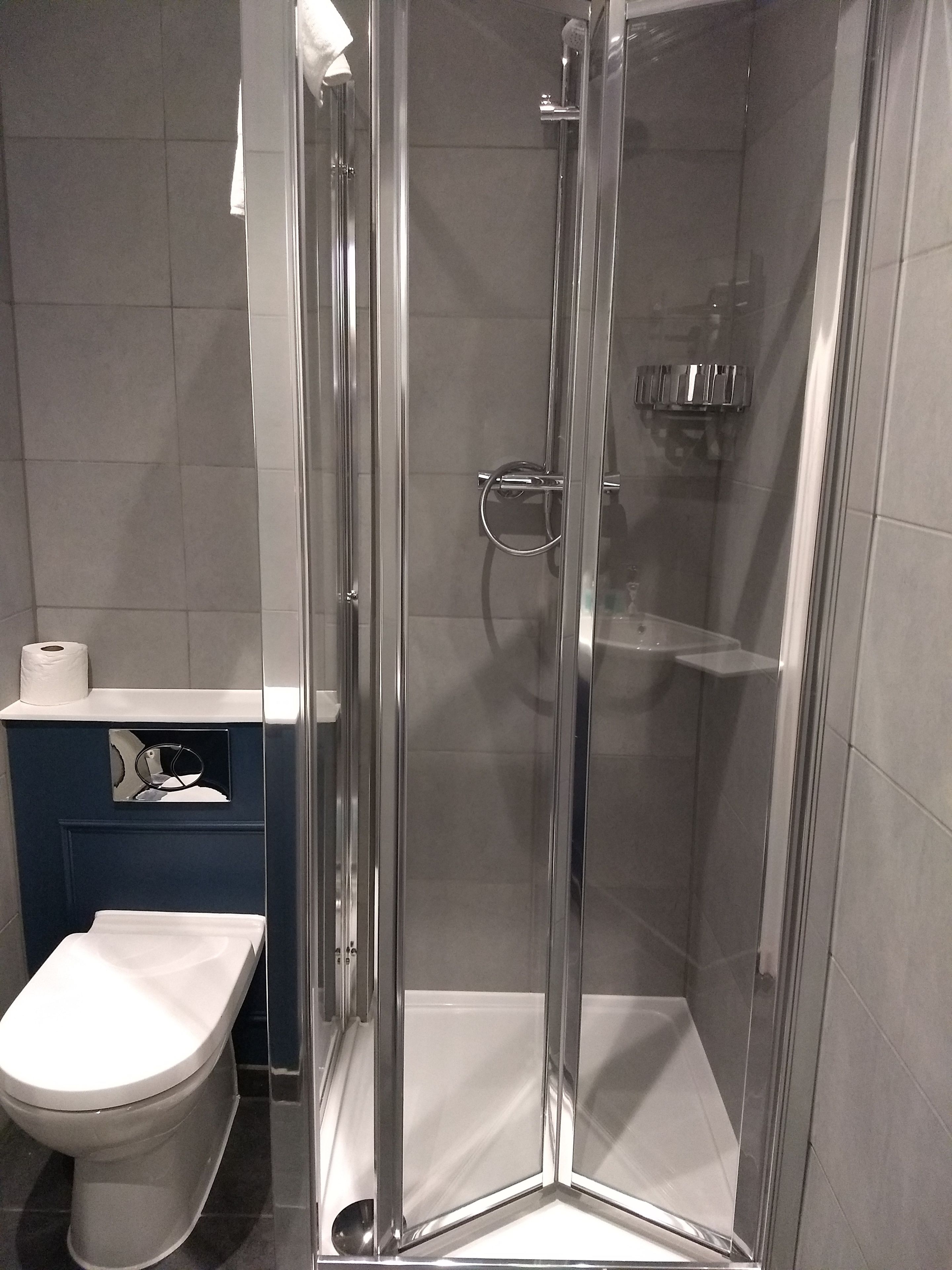 shower, free toiletries, hair dryer, towels