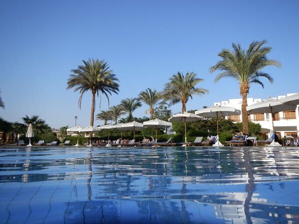 3 outdoor pools, open 7:00 AM to 7:00 PM, pool umbrellas, sun loungers