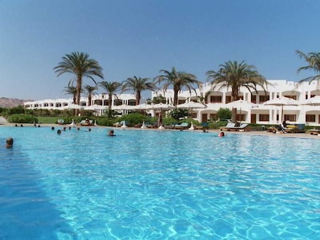 3 outdoor pools, open 7:00 AM to 7:00 PM, pool umbrellas, sun loungers
