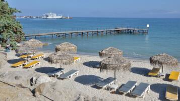 Private beach, sun loungers, beach umbrellas, beach towels