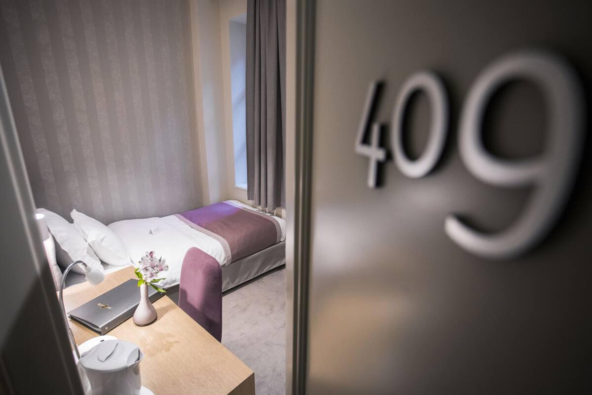 Økonomi-enkeltrom (Single Use) | Minibar, safe på rommet, skrivebord og blendingsgardiner