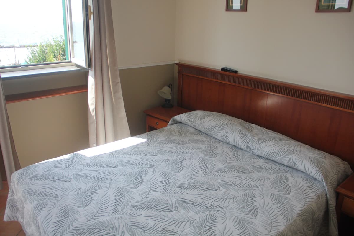 Desk, laptop workspace, free WiFi, bed sheets