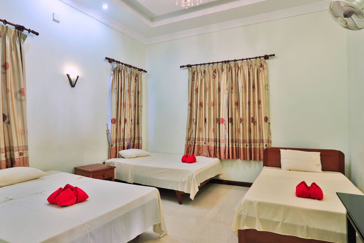 Standard Triple Room (Free Pick up) | 1 bedroom, minibar, desk, iron/ironing board (on request)