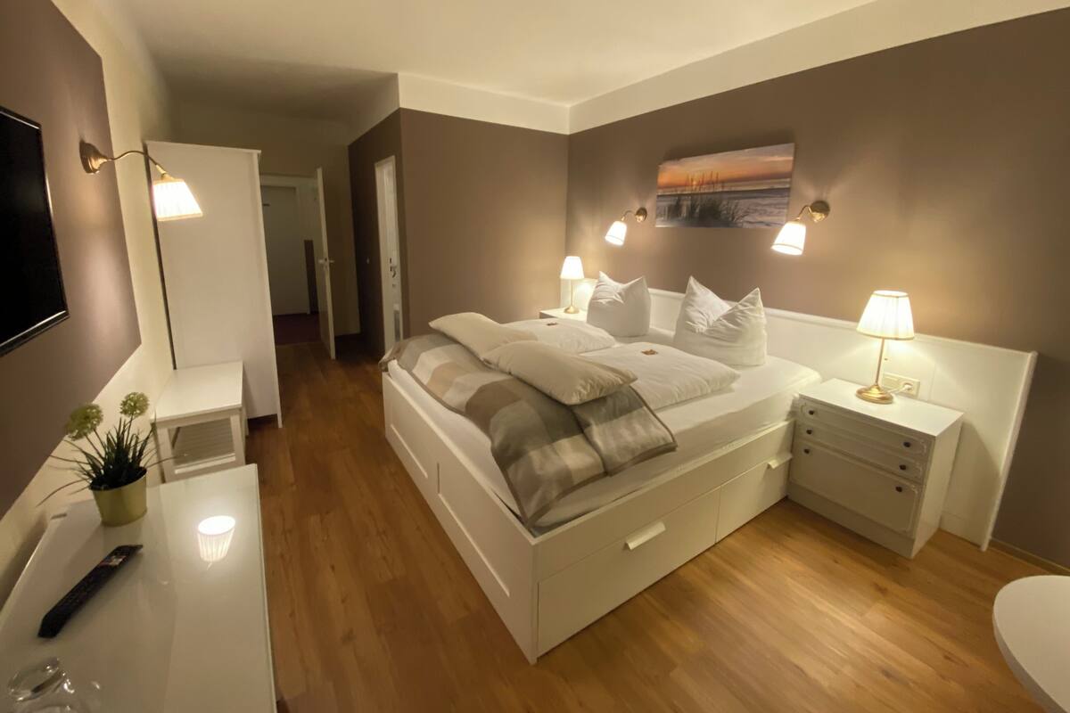 Hypo-allergenic bedding, desk, iron/ironing board (on request)