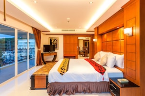 Executive Room, 2 Bedrooms, City View | In-room safe, desk, blackout drapes, iron/ironing board - Tara Court Hotel (Pattaya)