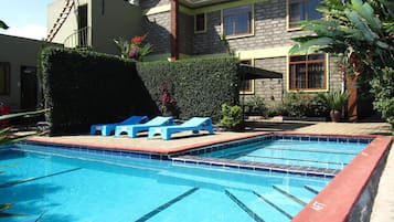 Outdoor pool, open 8:00 AM to 7:00 PM, pool umbrellas, sun loungers