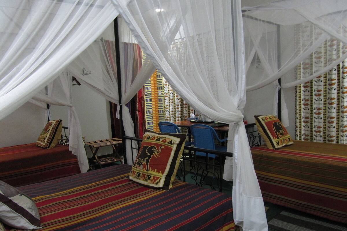 Premium bedding, desk, laptop workspace, iron/ironing board (on request)