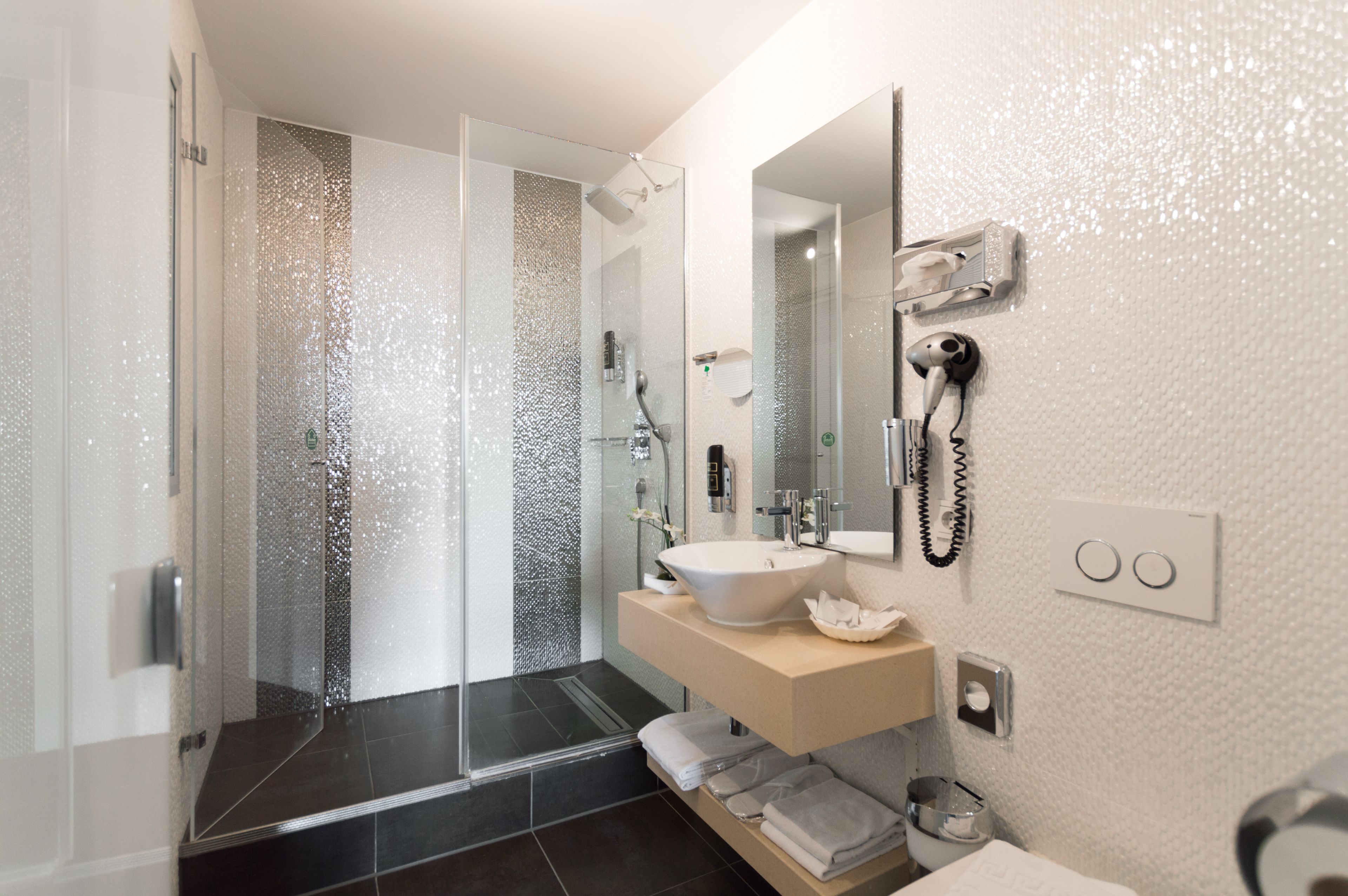 family room | bathroom | shower, hair dryer, slippers, towels