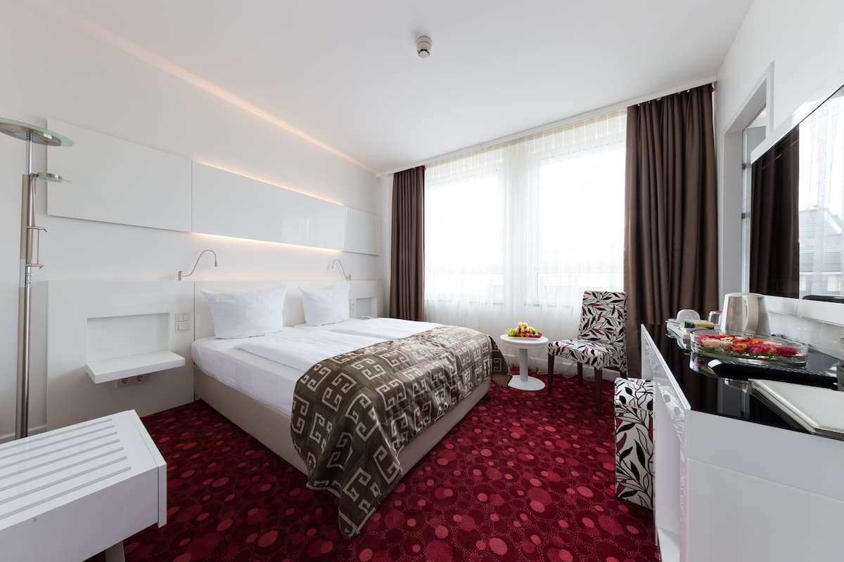 Eenpersoonskamer | Luxe beddengoed, Select Comfort-bedden, een minibar