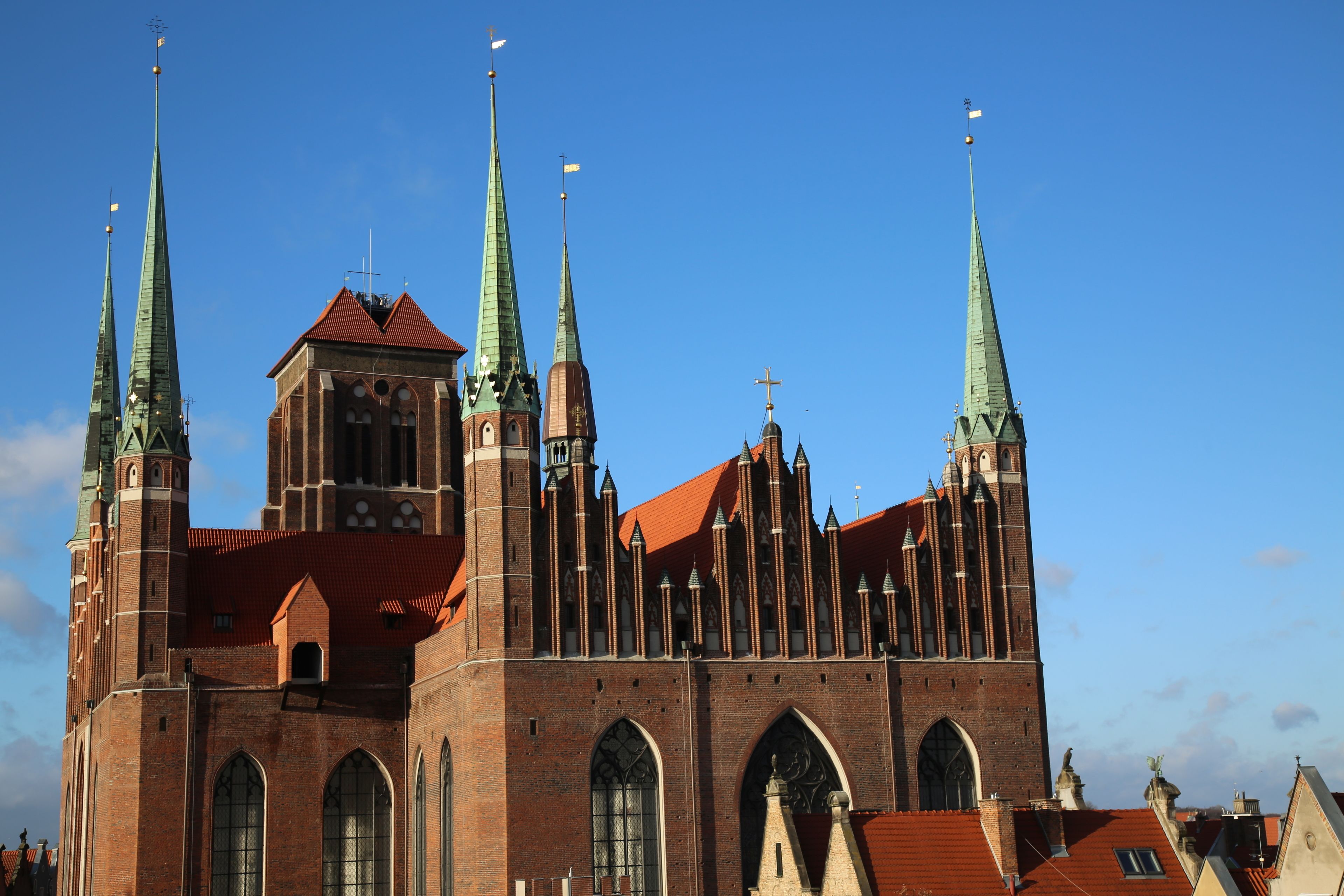A large, historic church with multiple spires and a prominent central tower.