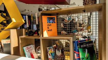 A bookstore with various books and decorative items on shelves.