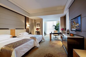 Een minibar, een kluis op de kamer, gratis wifi, een wekker
