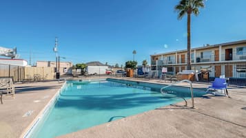 Outdoor pool, free pool cabanas, pool umbrellas