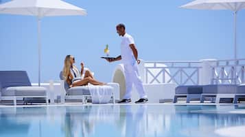 Outdoor pool, open 9:30 AM to 7:30 PM, pool loungers