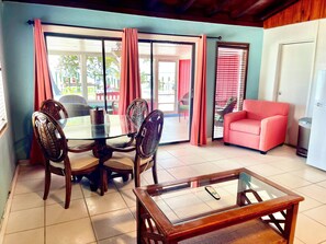 Suite, 1 King Bed with Sofa bed | Living area | TV