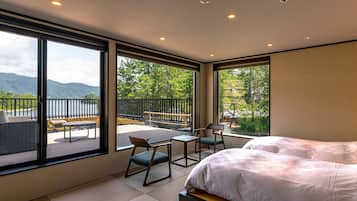 Habitación Deluxe con 2 camas individuales, balcón, vista al mar | Edredón, caja de seguridad en la habitación, wifi gratis y ropa de cama