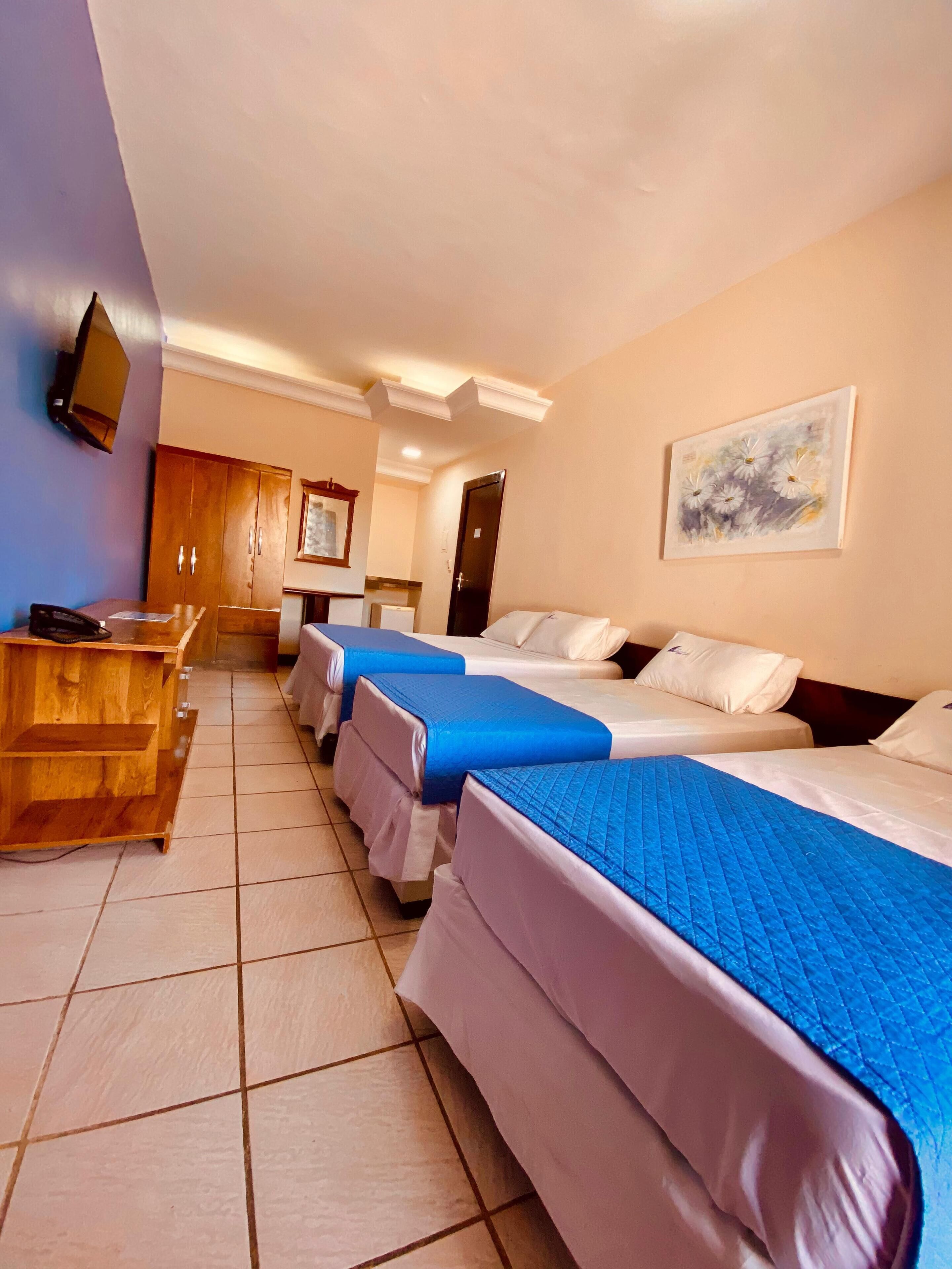 Standard Quadruple Room | In-room safe, free WiFi, bed sheets