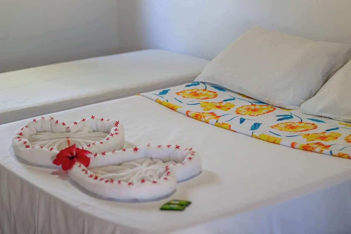 Standard Triple Room | Blackout drapes, iron/ironing board, free WiFi, bed sheets