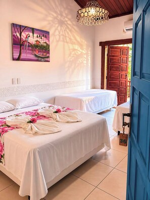 Standard Quadruple Room | Blackout drapes, iron/ironing board, free WiFi, bed sheets