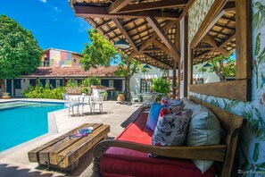 Outdoor pool, pool umbrellas, sun loungers