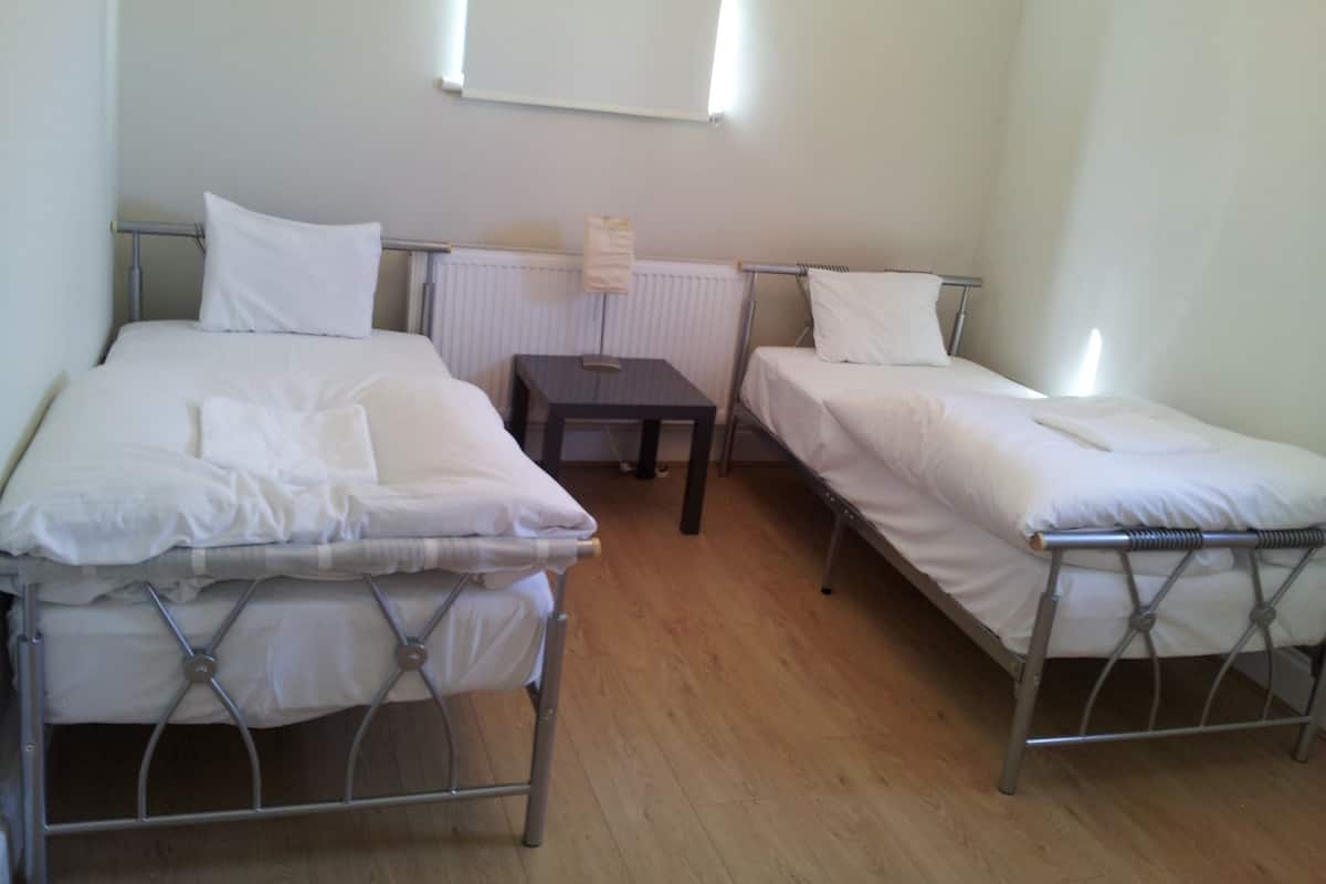 Doppel- oder Zweibettzimmer, Gemeinschaftsbad